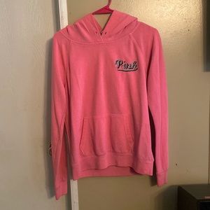 “Pink” hoodie definitely has been worn but still in good condition.